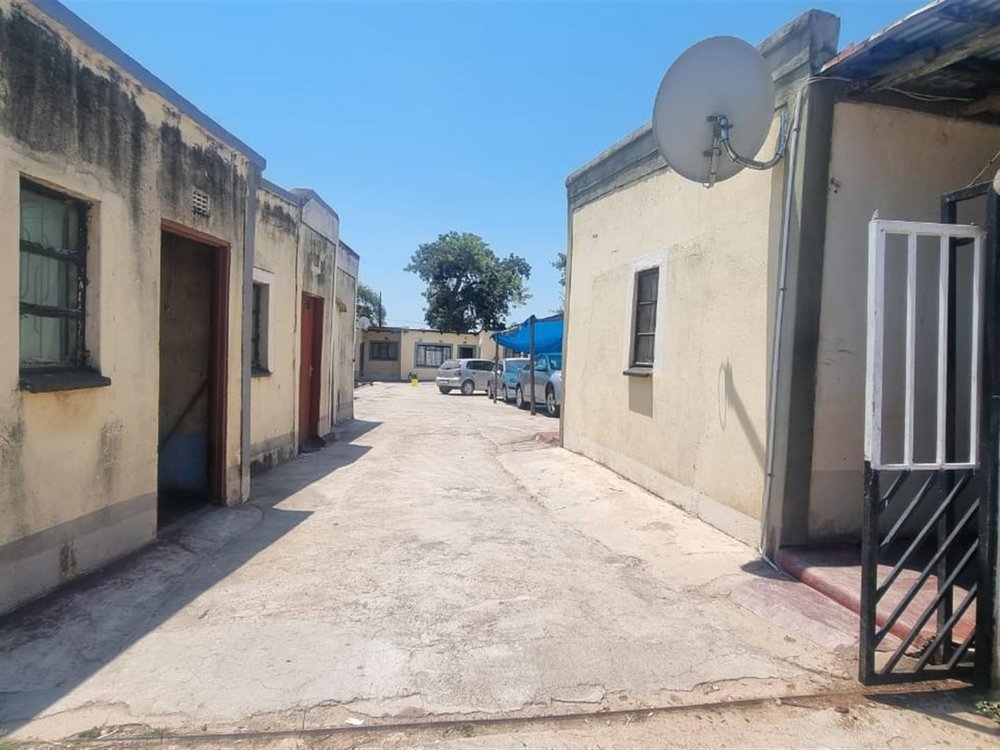 The property courtyard and parking area.